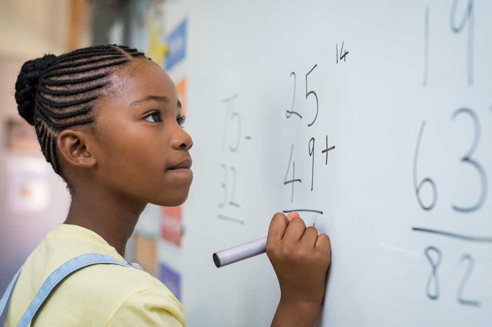 Girl at Blackboard